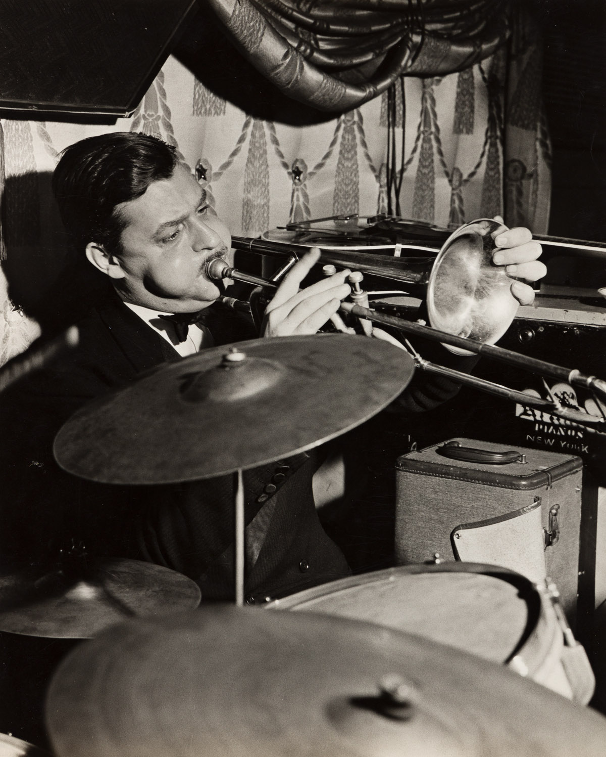 SKIPP ADELMAN & CHARLES PETERSON (1900-1976) A group of 4 jazz photographs, including two of Teddy Wilson by Adelman and one of Peewee